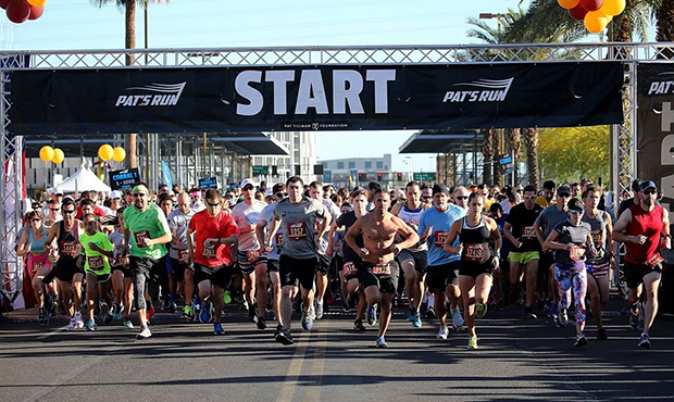 Runners take off after the starting gun at Pat's Run in Tempe. The race, will be run on April 13 th...