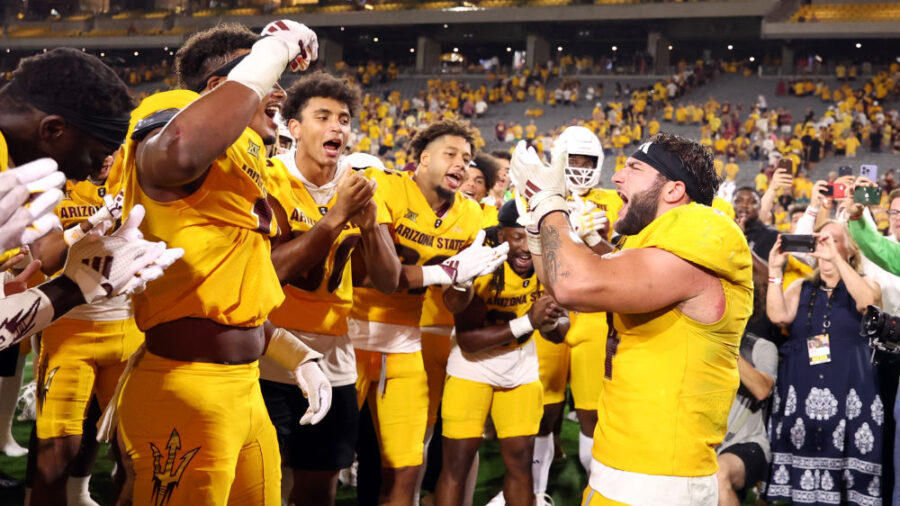TEMPE, ARIZONA - SEPTEMBER 07: Running back Cam Skattebo #4 of the Arizona State Sun Devils (R) cel...