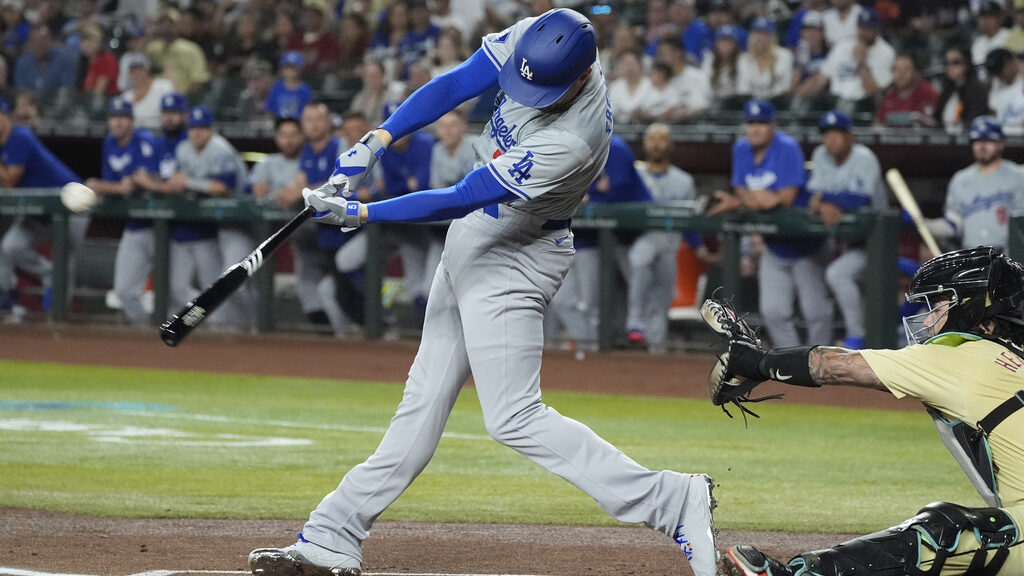 Dodgers get best of Diamondbacks pitching in wild series opener