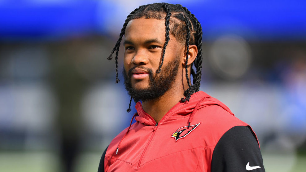 Injured Arizona Cardinals quarterback Kyler Murray (1) looks on before the NFL game between the Ari...